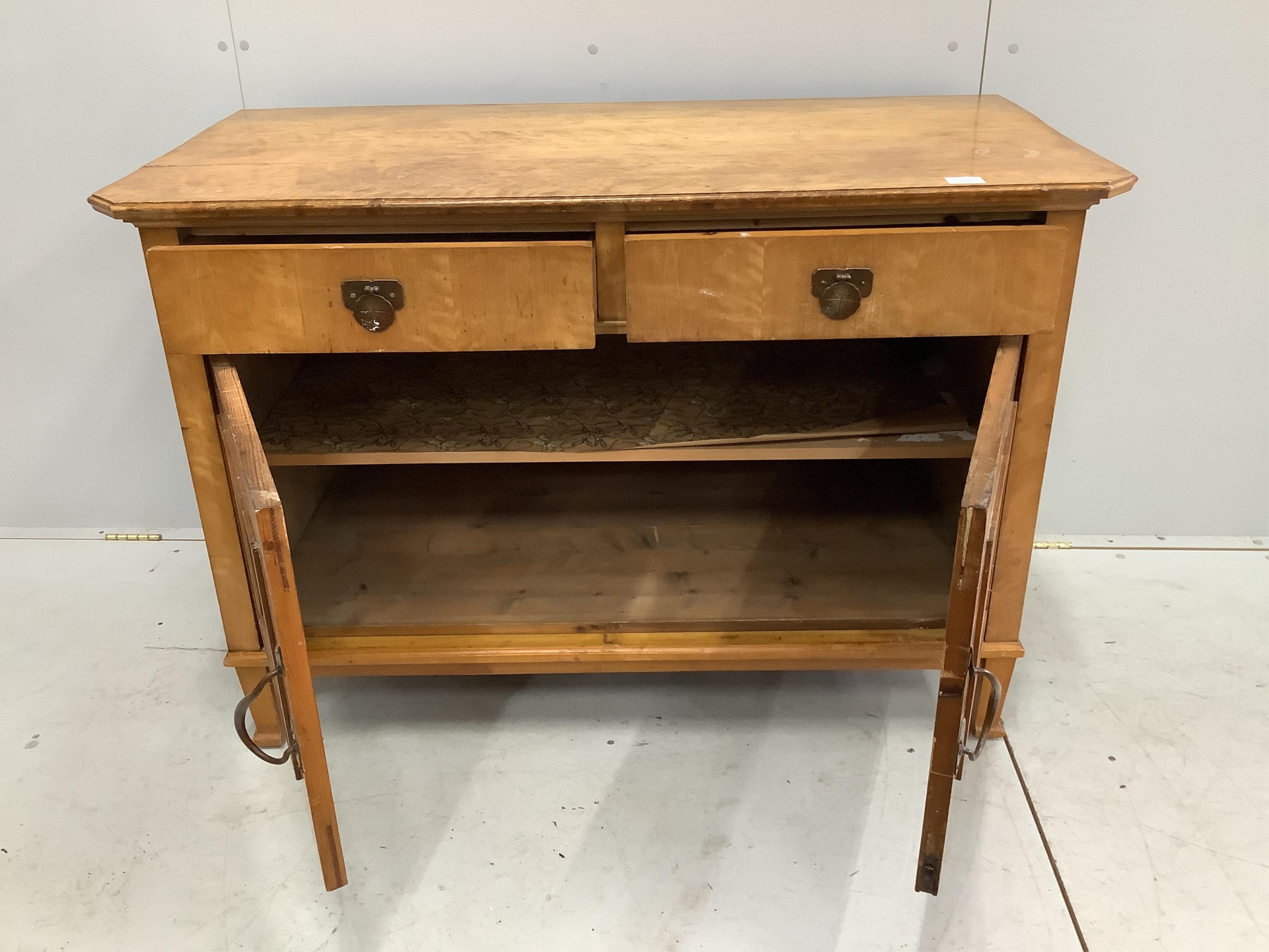 A Swedish Arts and Crafts birch commode, width 120cm, depth 61cm, height 83cm. Condition - fair